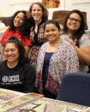 Professor Holly Barker with several of her students