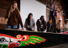 Student members of the canoe family participate in the cleansing of the canoe during the Canoe Awakening in April 2023. Photo by Mark Stone.