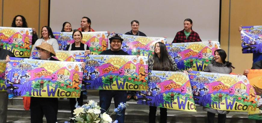 Students holding banners at the Clear Sky 10 year celebration