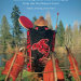 Cover photo of book showing woman wearing traditional Nhu-chah-nulth blanket, with arms raised, holding a drum