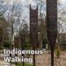 Booklet cover photo of bronze paddles in front of Burke museum